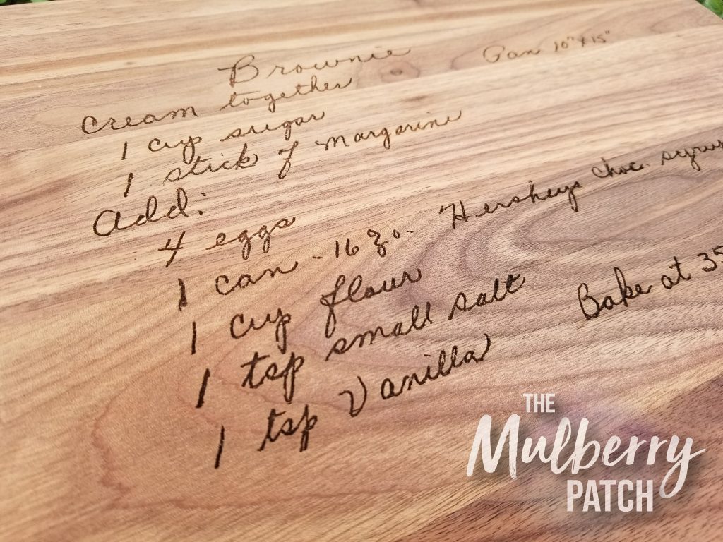 Close up of laser engraved recipe on a wooden cutting board