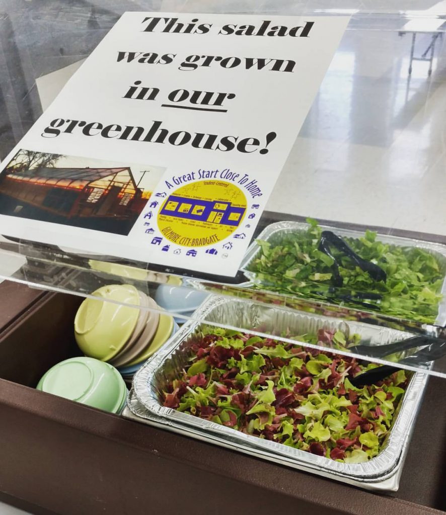 "This salad was grown in our greenhouse! sign in front of salad bar. 